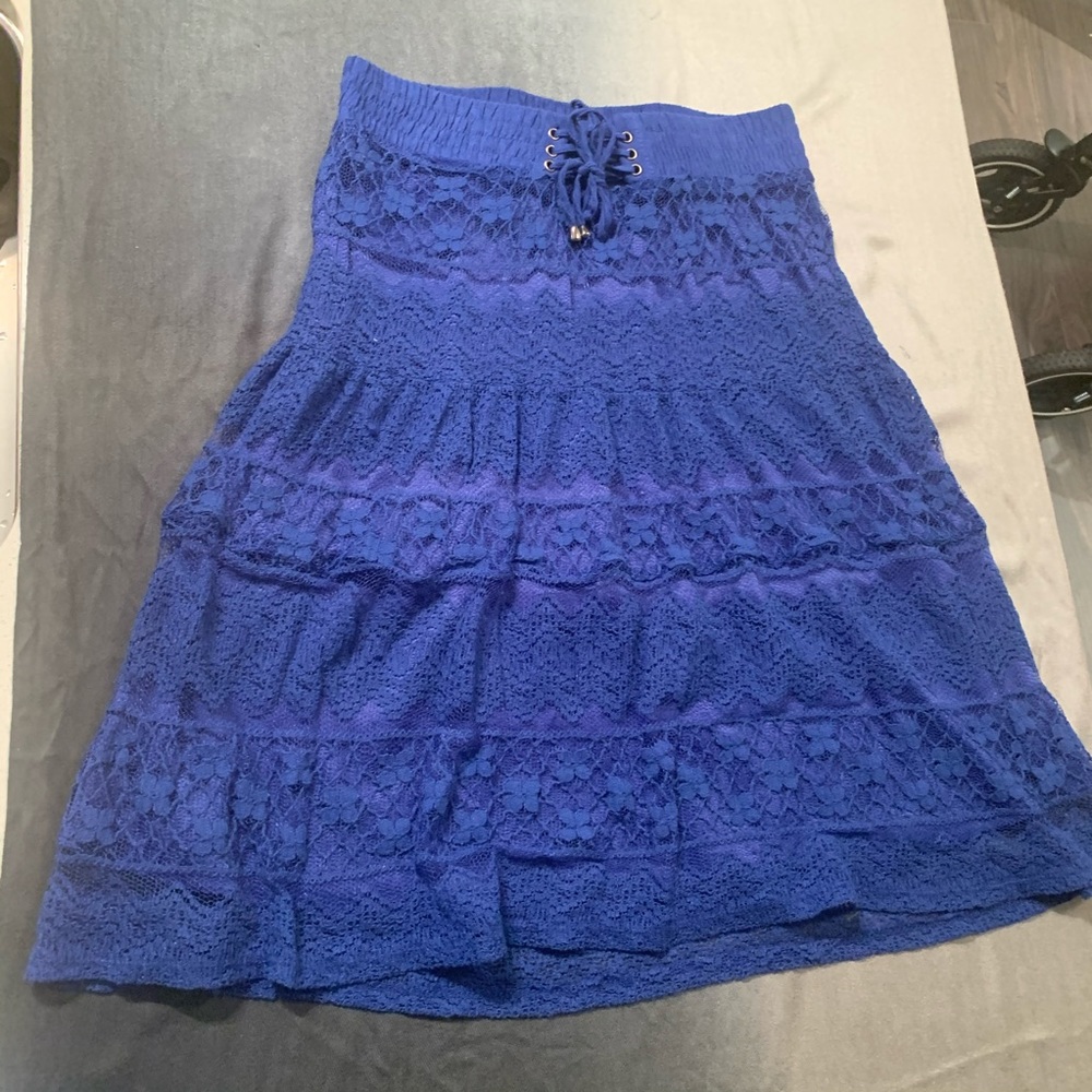 Blue lace skirt knee length.